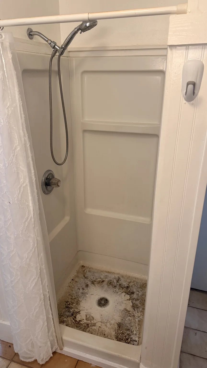 Bathroom shower at the start of a documented Deep Cleaning in Aiea.